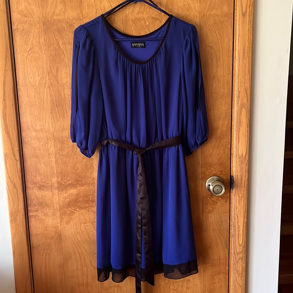 Enfocused Sudio blue dress with sheer slit sleeves, and black trim & ribbon belt